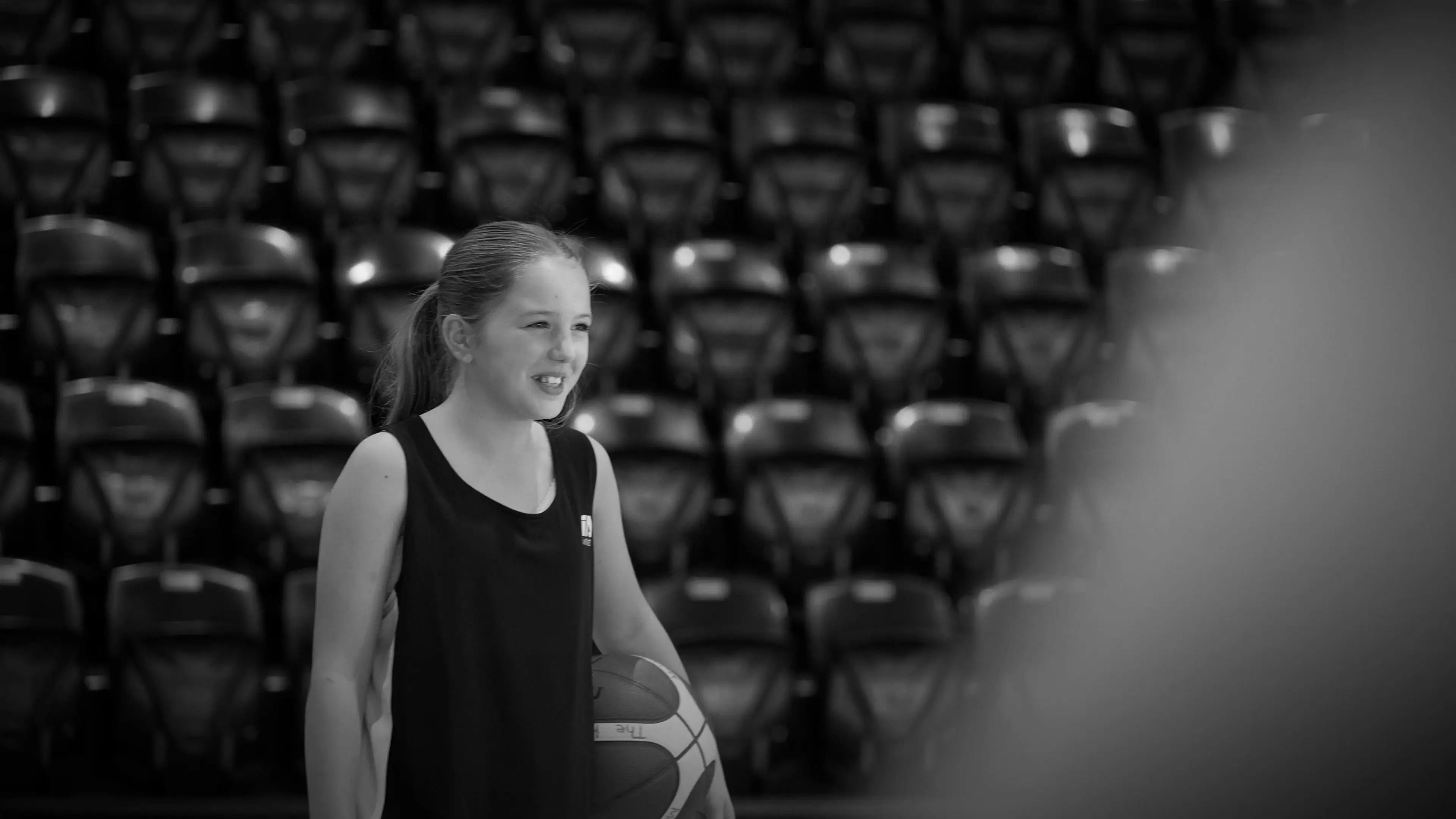 Student playing basketball
